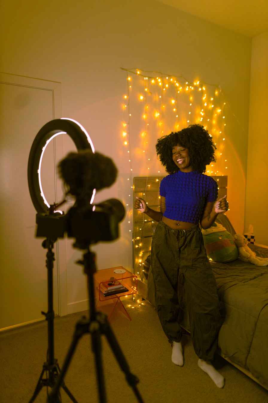 Content Creator Using Phone and Ring Light for Shoot